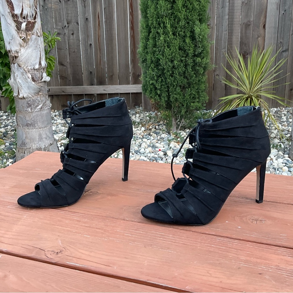 BCBGeneration Black Stiletto Heels with Peep-Toe Design